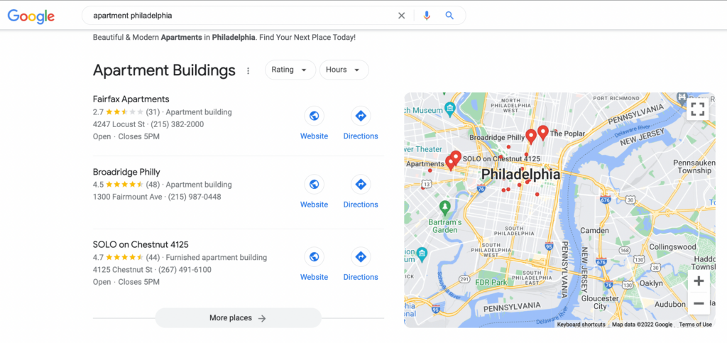 Search engine results page for keyword apartment Philadelphia featuring Googles local pack and maps highlighting apartment multi family locations 