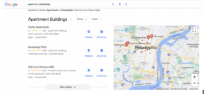 search engine results page for keyword apartment philadelphia featuring googles local pack and maps highlighting apartment multi family locations